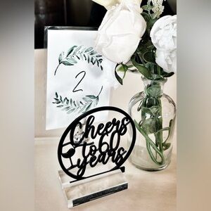 Set of 8 Cheers to 60 Years black table signs. Celebrate milestone moments